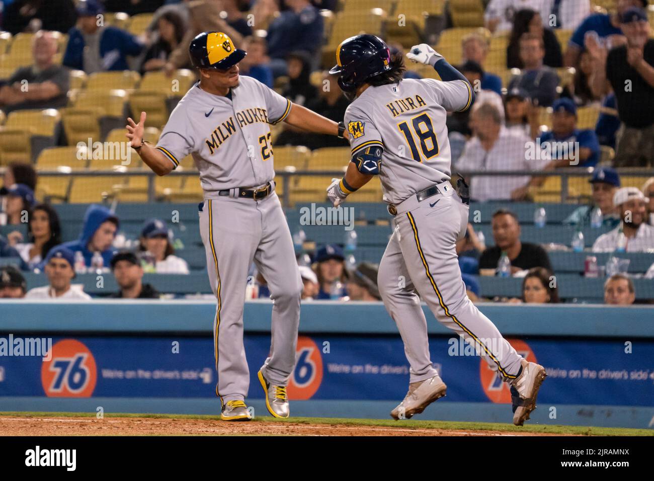 Milwaukee Brewers first baseman Keston Hiura (18) celebrates with first