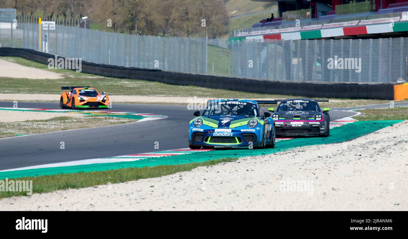 Porsche 911 gt race car action on racetrack. Mugello, Italy, march 25 2022. 24 Hours series Stock Photo