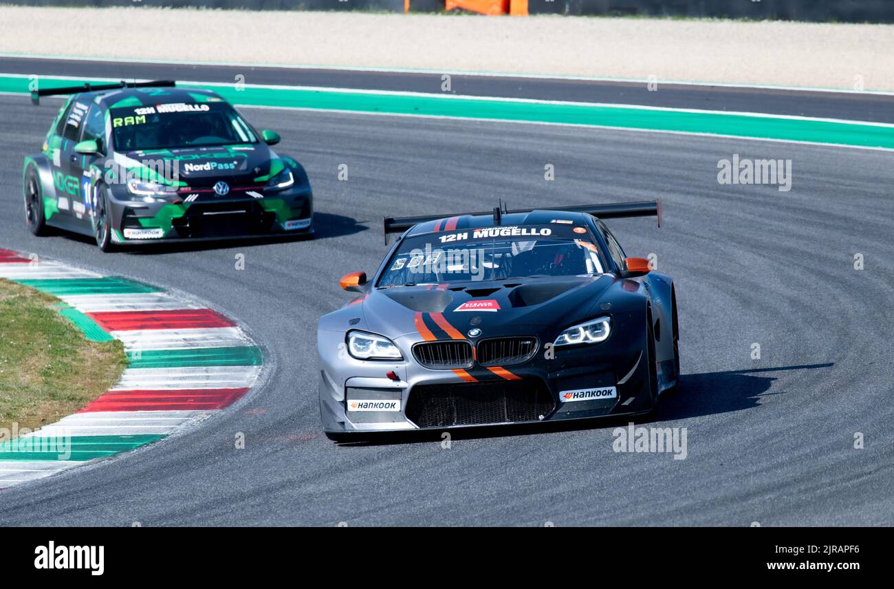 BMW M6 gt race cars action on racetrack turn. Mugello, Italy, march 25 2022. 24 Hours series Stock Photo