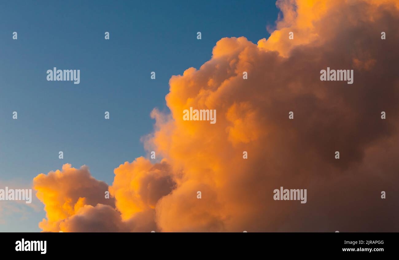 Cumulus and Stratus clouds in dramatic sunset sky over Cape Town Stock