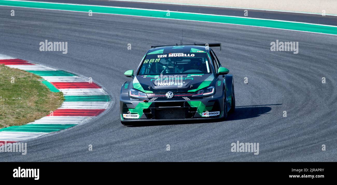 Volkswagen Golf gt race car action on racetrack turn. Mugello, Italy, march 25 2022. 24 Hours series Stock Photo