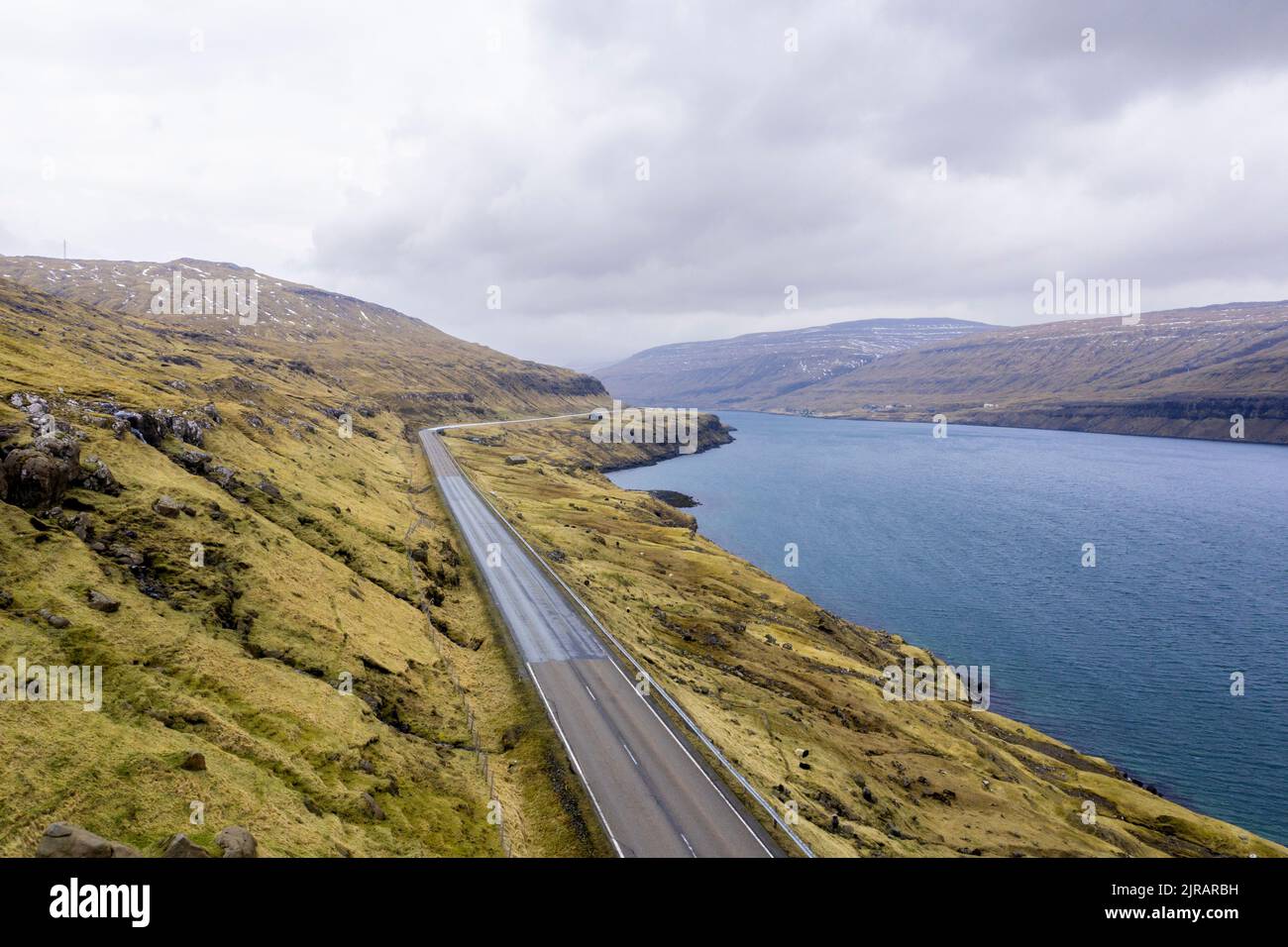 Remote Highway Remote highway stretching along edge of fjord Stock Photo - Alamy
