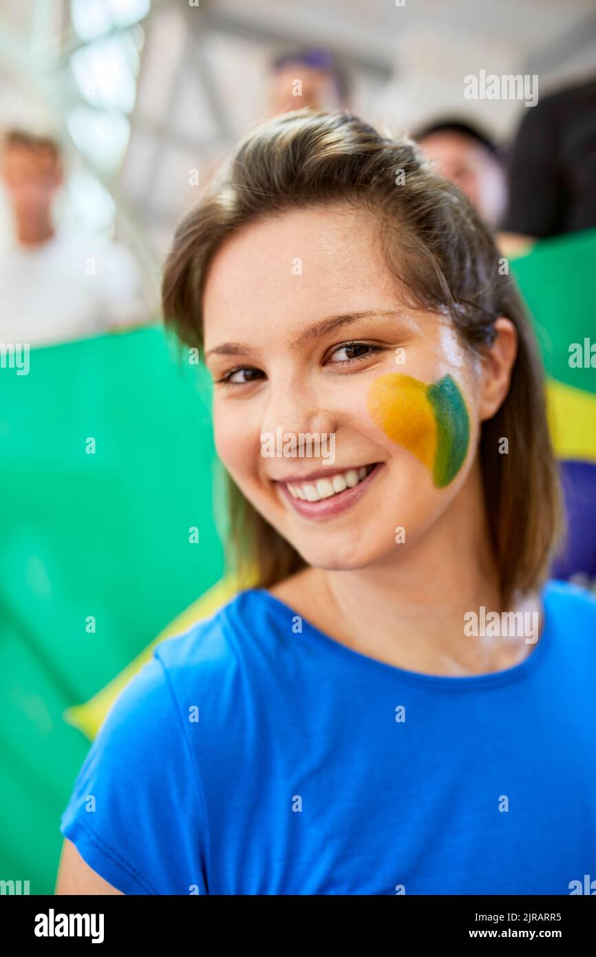 Young smiling woman showing Brazil Flag on face Stock Photo Alamy