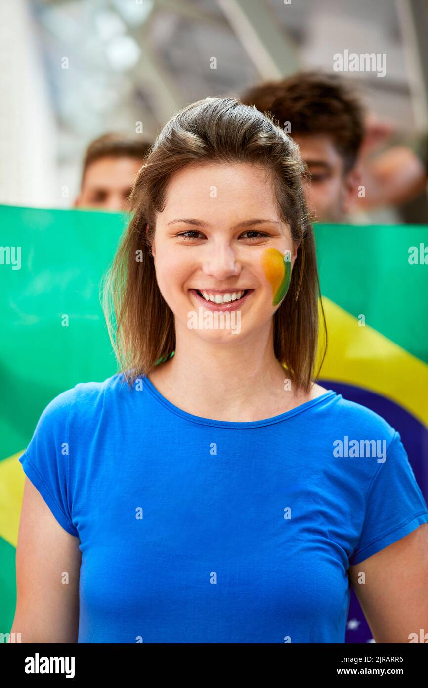 Smiling woman with Brazil Flag painted on face Stock Photo Alamy