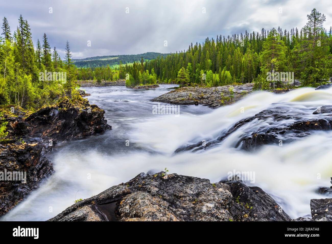 Sweden, Vasterbotten County, Long exposure of Dimforsen waterfall Stock Photo