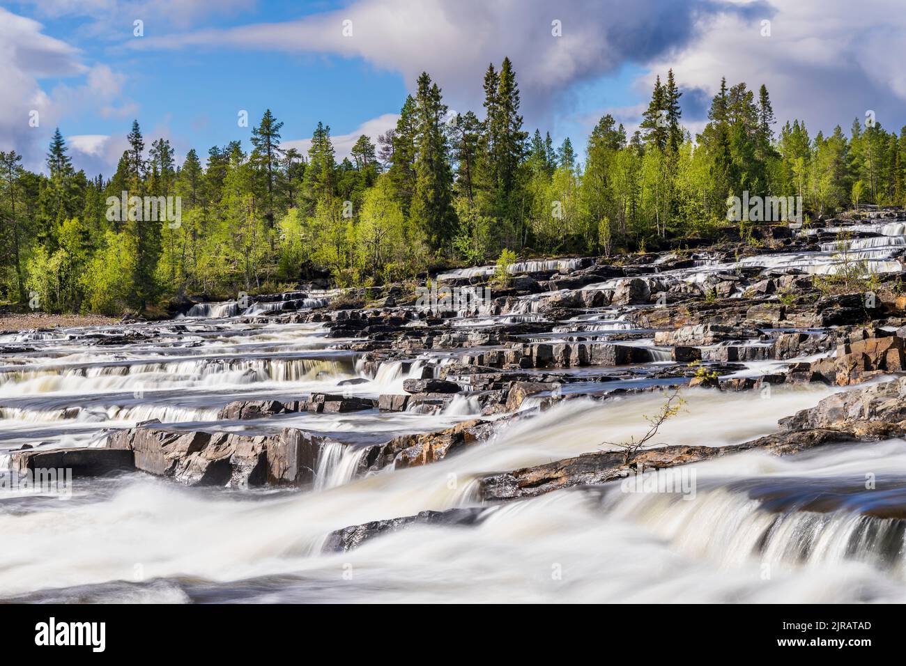 Sweden, Vasterbotten County, Long exposure of Trappstegsforsen waterfall Stock Photo