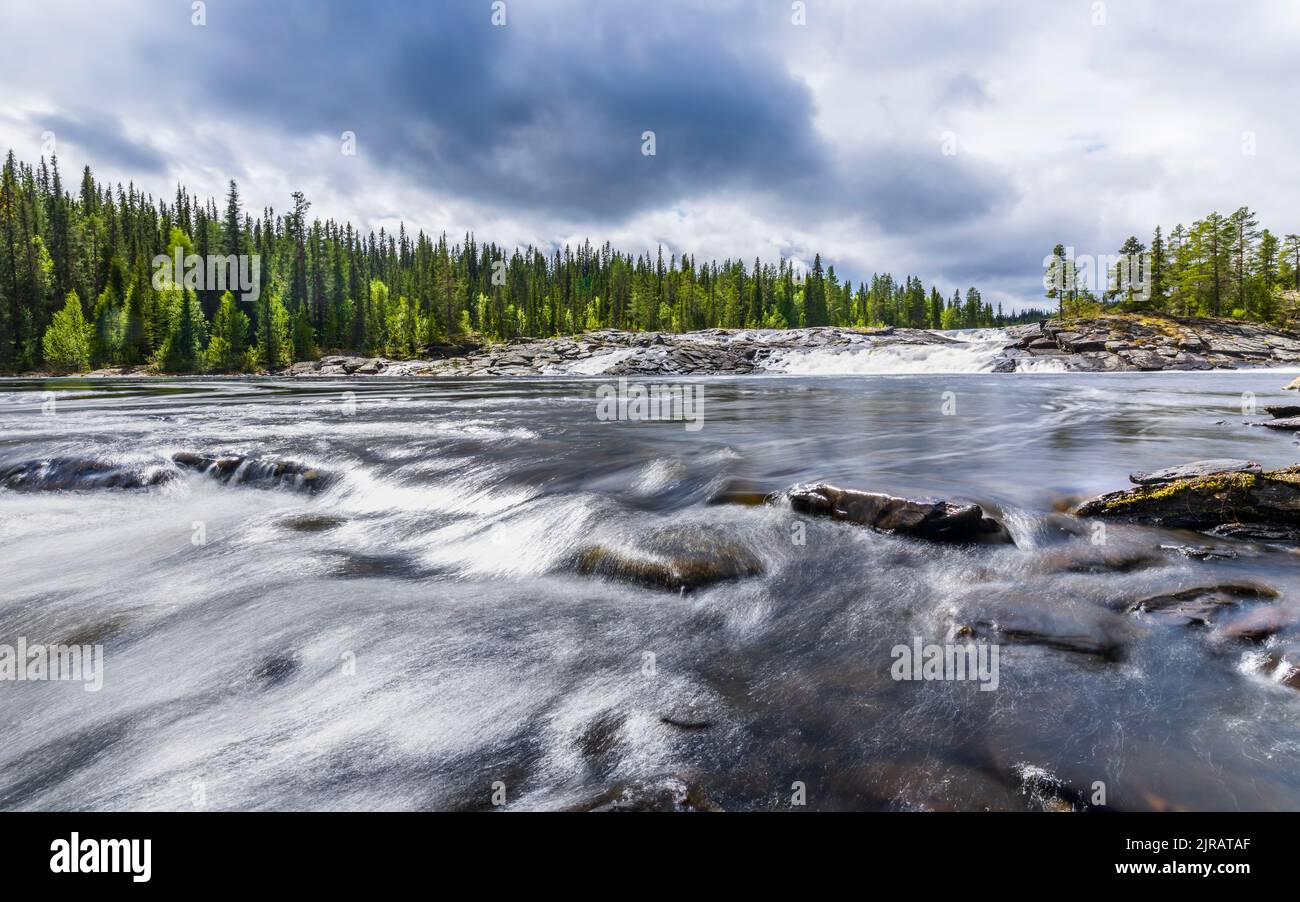 Sweden, Vasterbotten County, Long exposure of Dimforsen waterfall Stock Photo