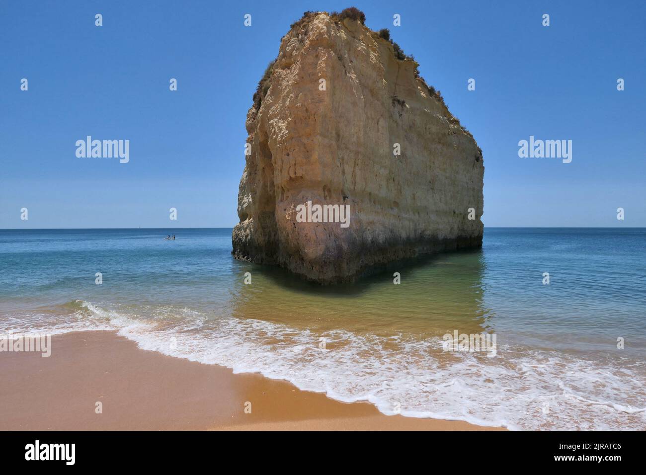 Algarve beach, ship rock in Atlantic Ocean, Cova Redonda beach. Stock Photo