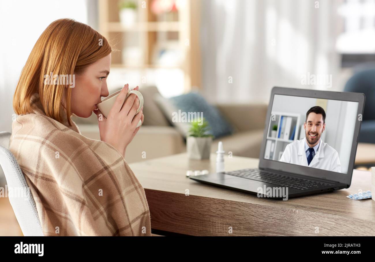 sick woman having video call with doctor at home Stock Photo - Alamy