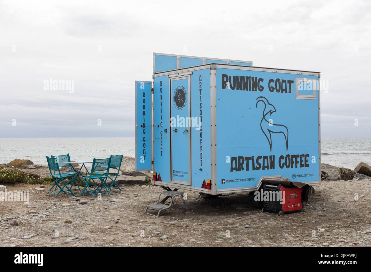 Garrettstown, Cork, Ireland. 23rd August, 2022. With the summer season coming to an end there are empty chairs at a mobile cafe in Garrettstown, Co. Cork, Ireland. - Credit; David Creedon / Alamy Live News Stock Photo