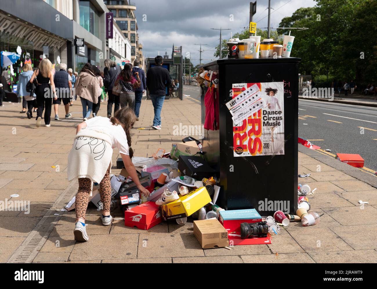 Edinburgh, Scotland, UK. 23rd  August 2022. Rubbish is seen piled on the streets of Edinburgh city centre on day six of a 12 day strike by city refuse collectors. Pic; Rubbish next to full bin on Princes Street. Iain Masterton/Alamy Live News Stock Photo
