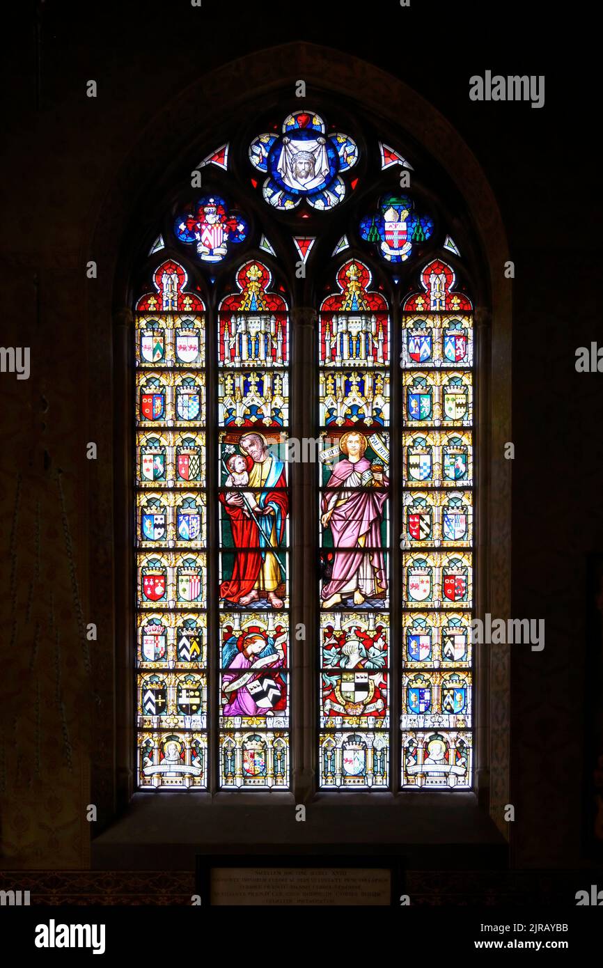 Holy Blood chapel, Figurative stained-glass window, Bruges, Belgium Stock Photo