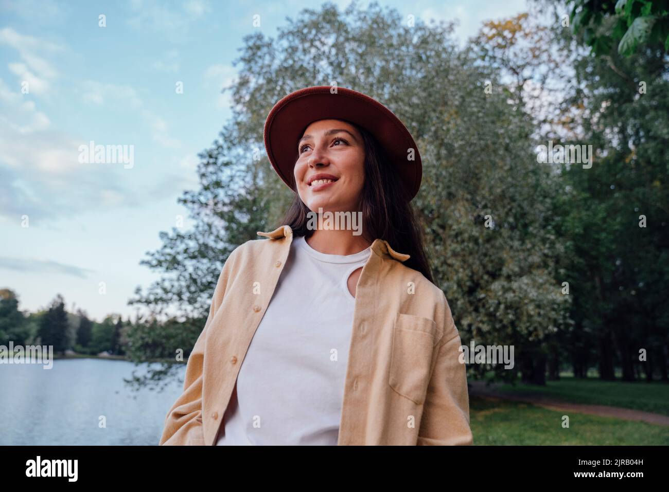 Lake thinking woman hat hi-res stock photography and images - Alamy