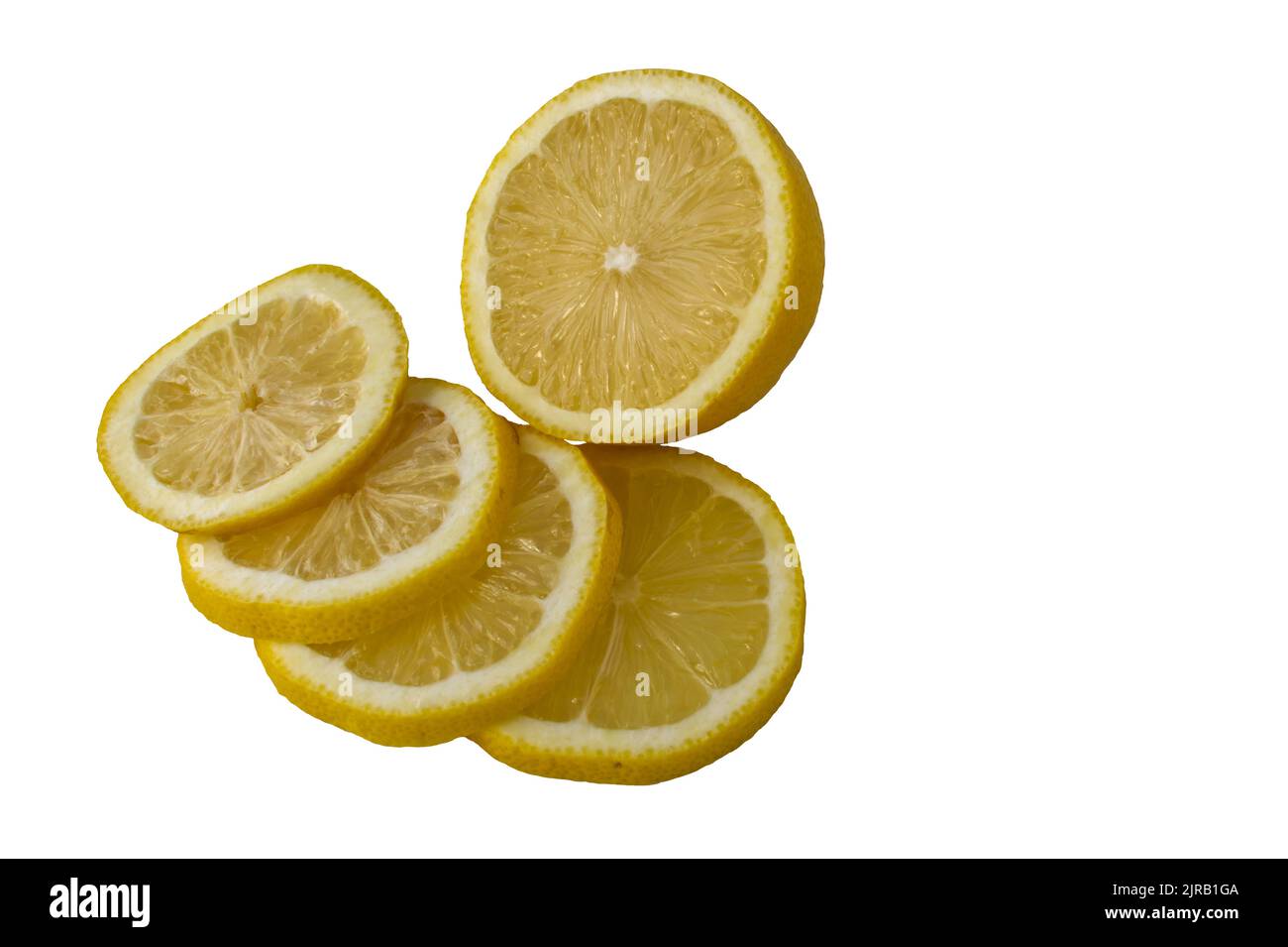 Whole lemon sliced, (citrus limon, rutaceae). Isolated on white background. Stock Photo