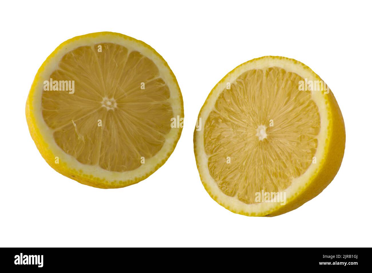 Whole lemon sliced in half. (citrus limon, rutaceae). Isolated on white background. Stock Photo
