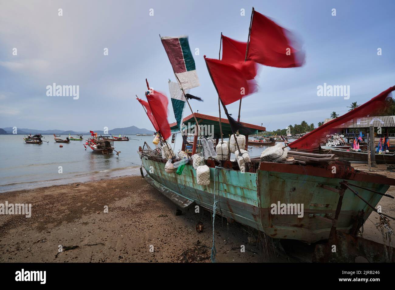Red flags hanging on boat Stock Photo Alamy