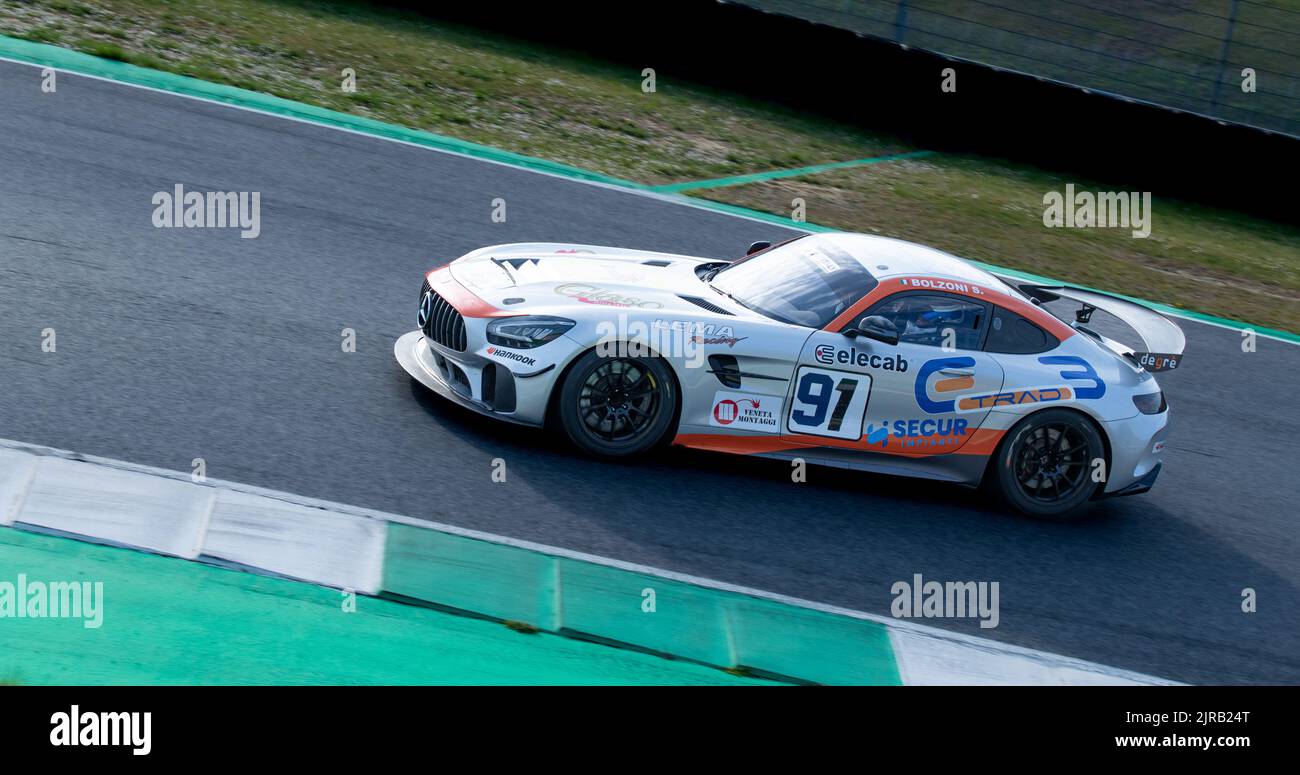 Mercedes AMG gt racing car action on racetrack. Mugello, Italy, march 25 2022. 24 Hours series Stock Photo