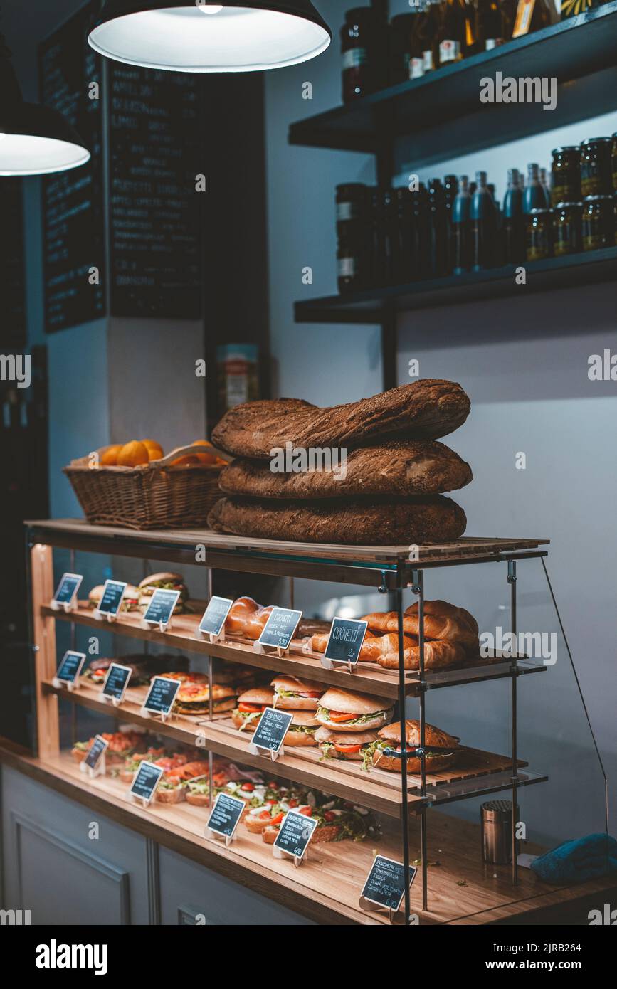 Varieties of breads arranged on display in cafe Stock Photo Alamy