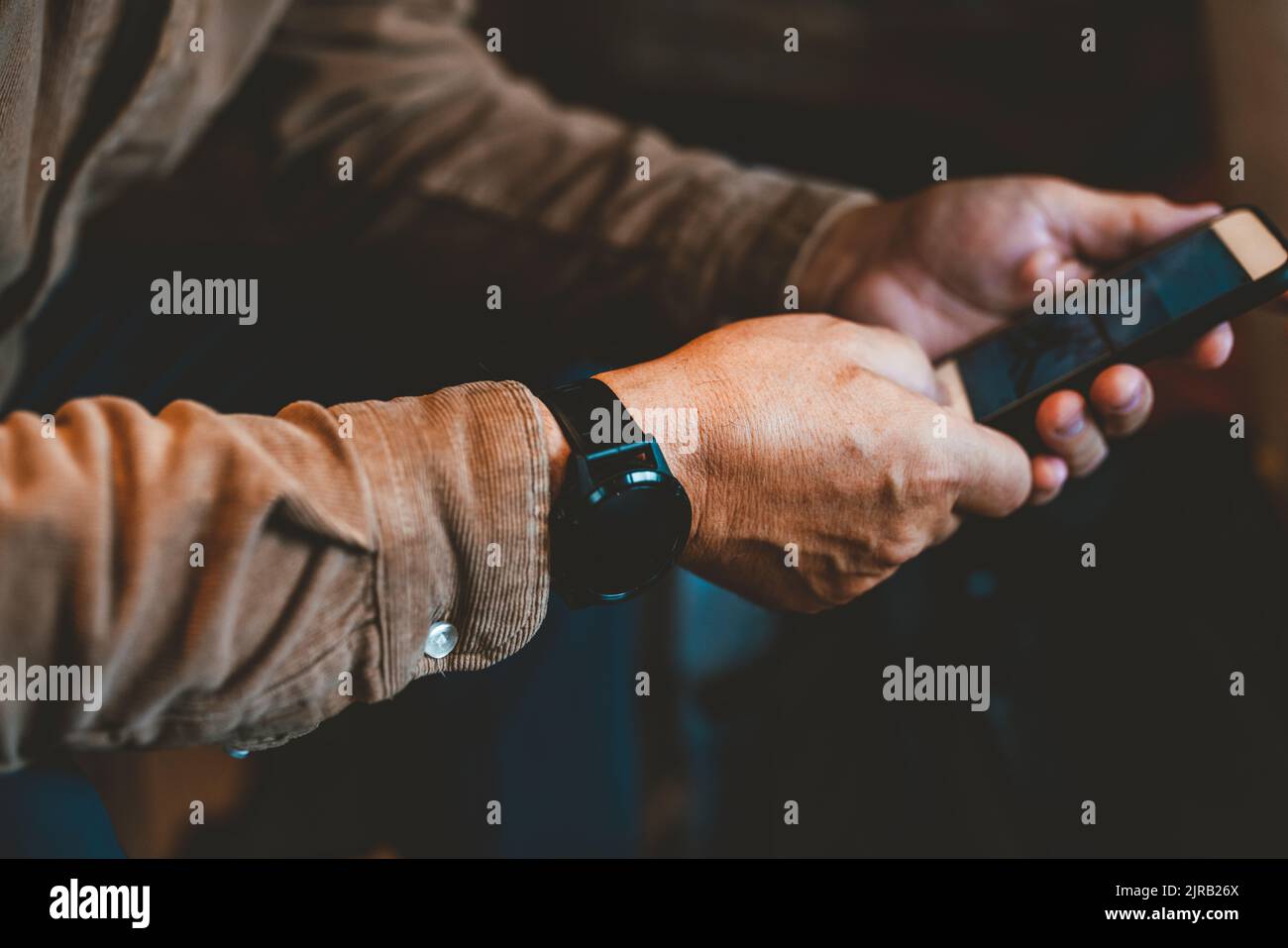 Senior man using mobile phone Stock Photo
