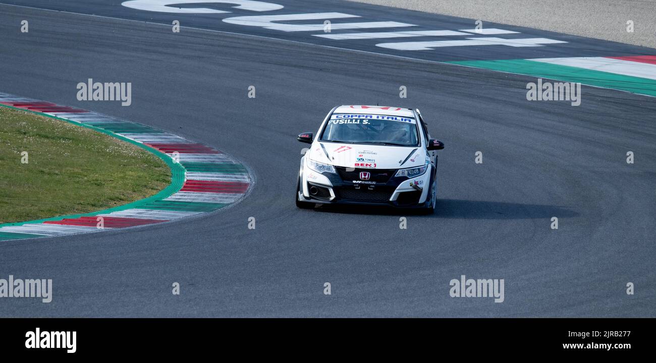 Honda Civic racing car action on racetrack. Mugello, Italy, march 25 2022. 24 Hours series Stock Photo