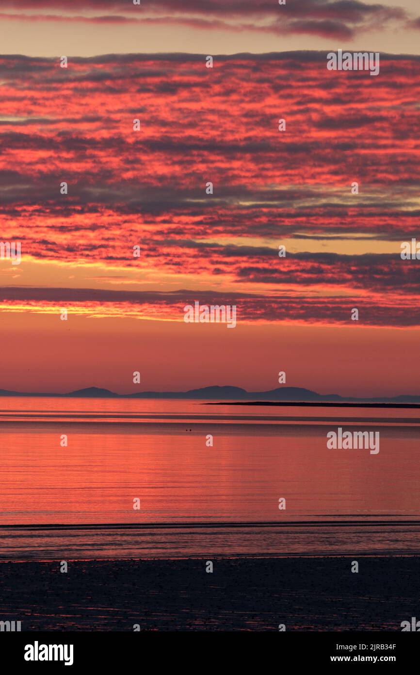 Prestwick, Ayrshire, Scotland, UK. The sun sets of the Firth of Clyde
