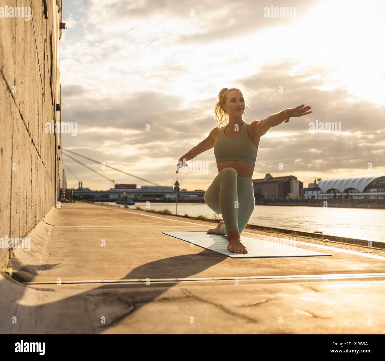 Woman outstretched arms yoga hi-res stock photography and images - Alamy