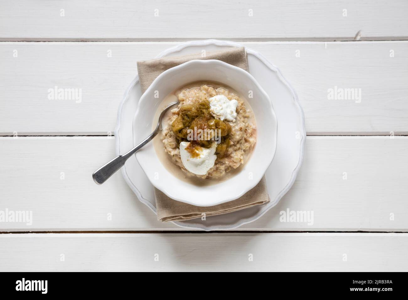 Studio shot of bowl of porridge with cottage cheese Stock Photo - Alamy