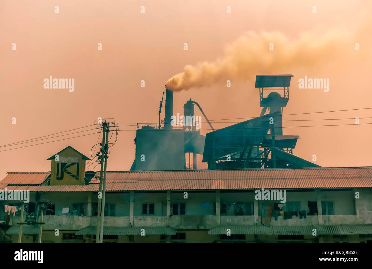 Dark smoke as a result of coal being burnt in furnaces, billowing out