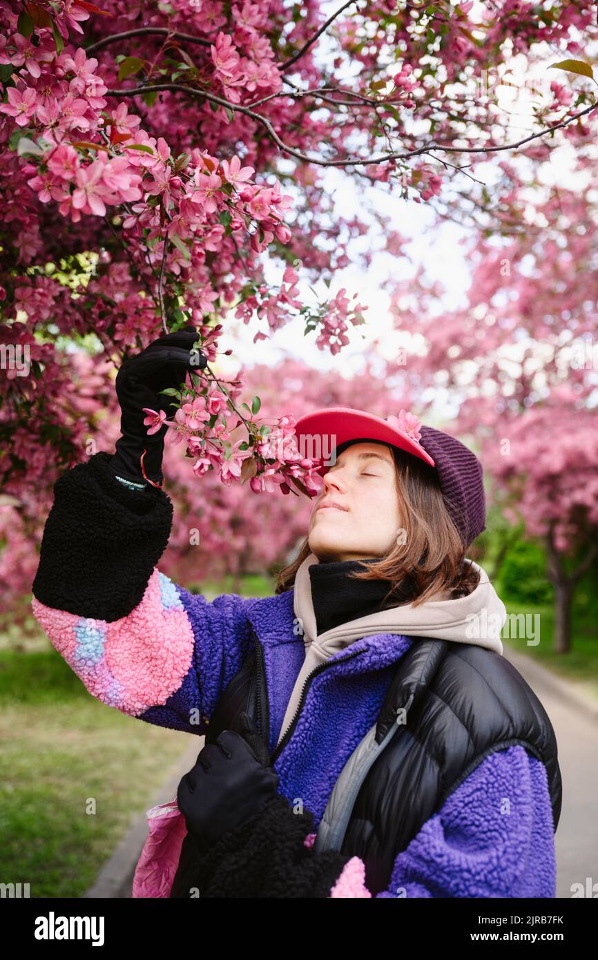 Woman smelling apple hi-res stock photography and images - Alamy