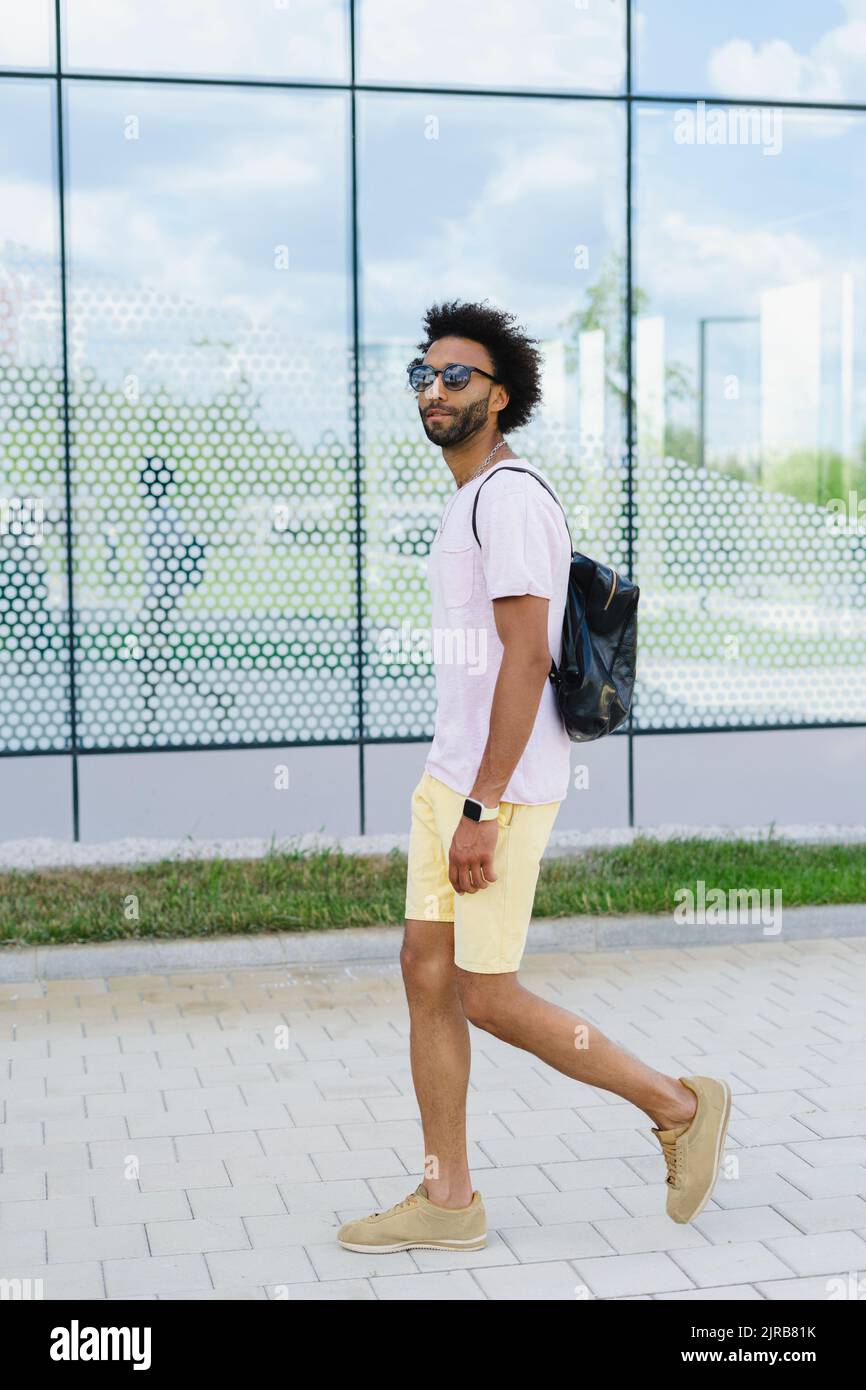Reflection man walking glass hi-res stock photography and images - Alamy