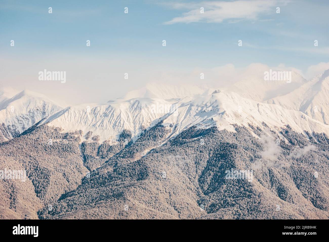 Mountain peaks covered with snow Stock Photo - Alamy