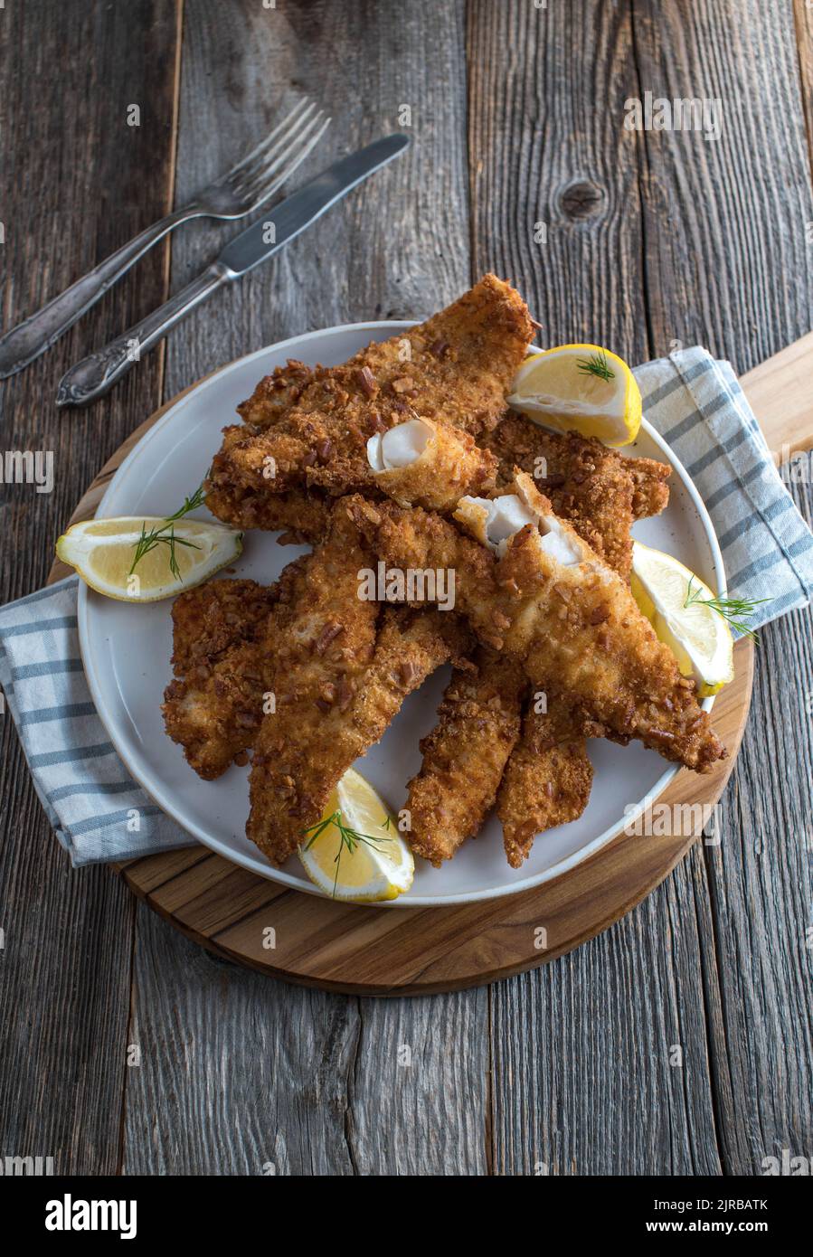 Crispy fried fish with pretzel breading Stock Photo Alamy