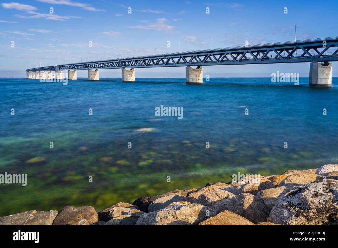 Denmark, Copenhagen, Long exposure of Oresund Bridge and surrounding sea Stock Photo