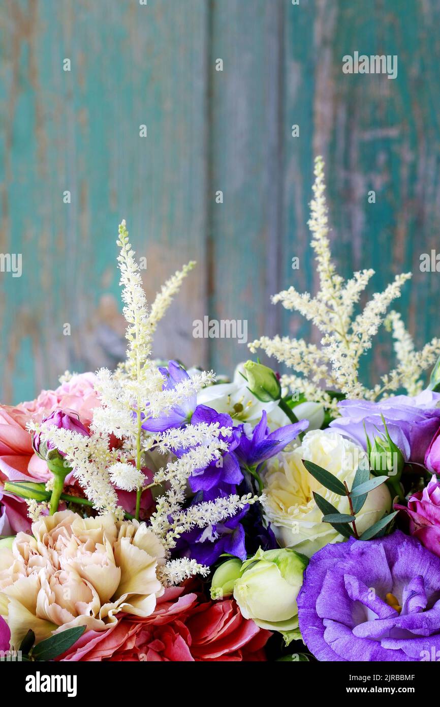 Flower background with rose, eustoma, carnation and spiraea. Graphic resources Stock Photo