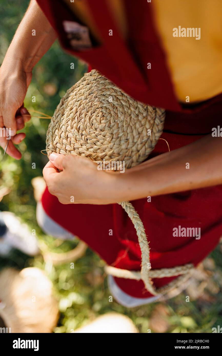 Hands of artisan weaving esparto grass Stock Photo Alamy