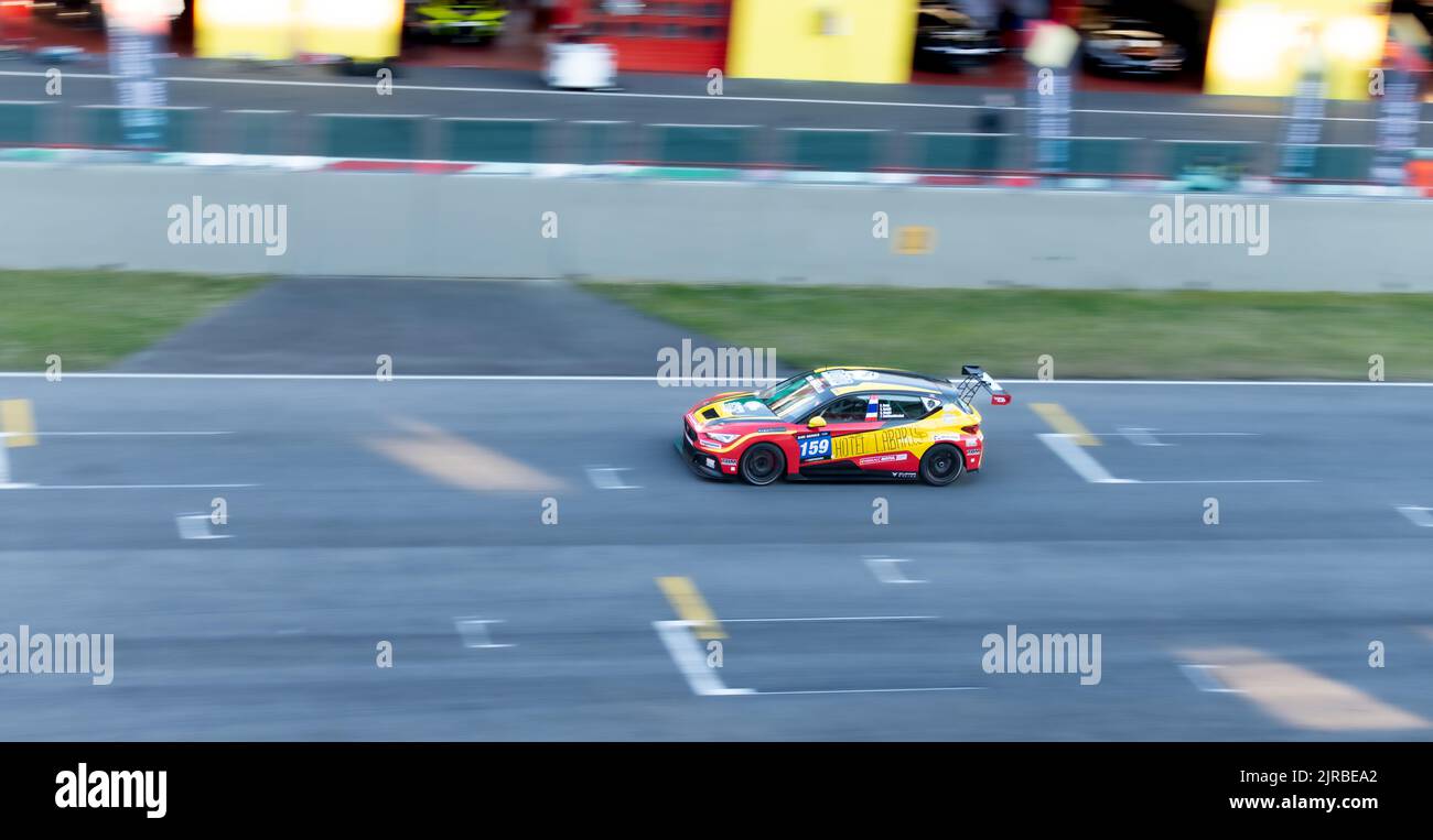 Speed concept Cupra racing car fast on racetrack blurred motion background. Mugello, Italy, march 25 2022. 24 Hours series Stock Photo