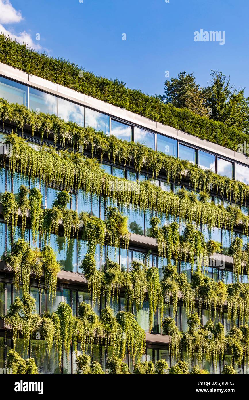 Germany, Baden-Wurttemberg, Stuttgart, Office building covered in green ...