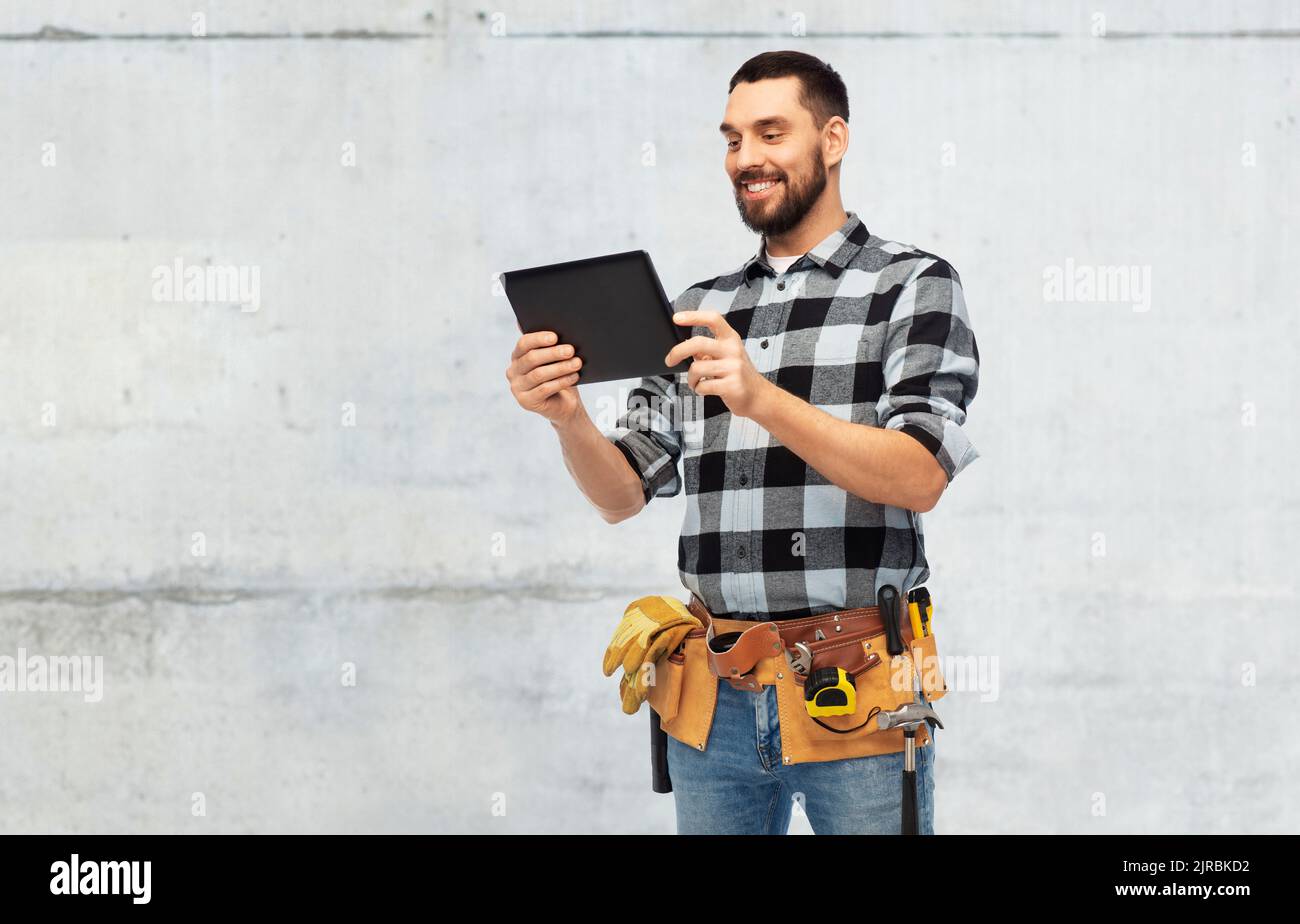 Happy builder with tools hi-res stock photography and images - Alamy