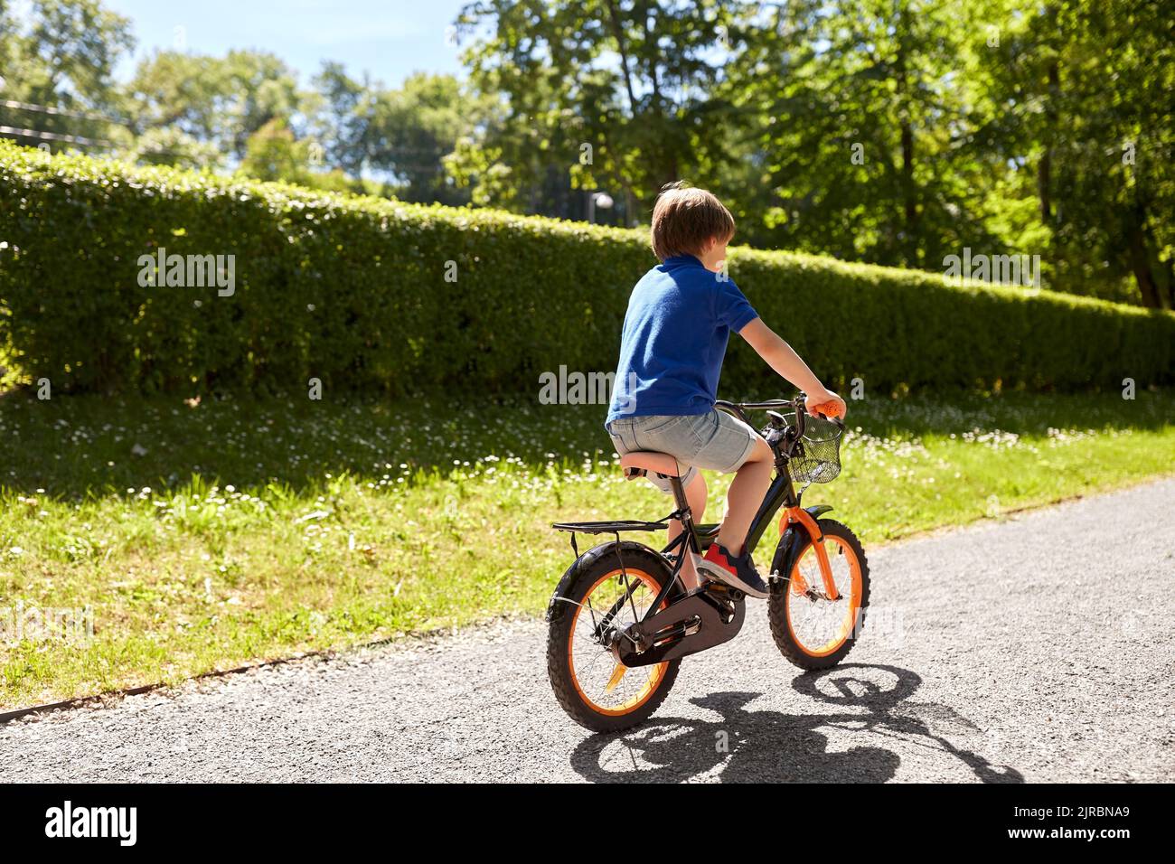 Rear view little kid bicycle hires stock photography and images Alamy