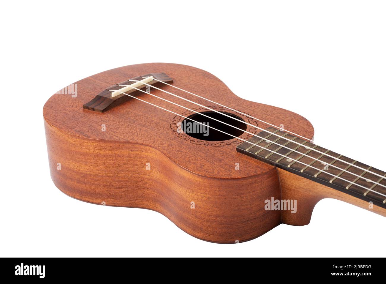 Wooden ukulele guitar isolated over white background Stock Photo