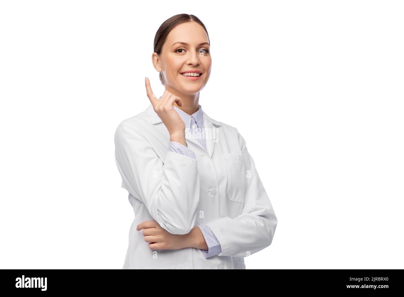 happy female doctor pointing finger up Stock Photo