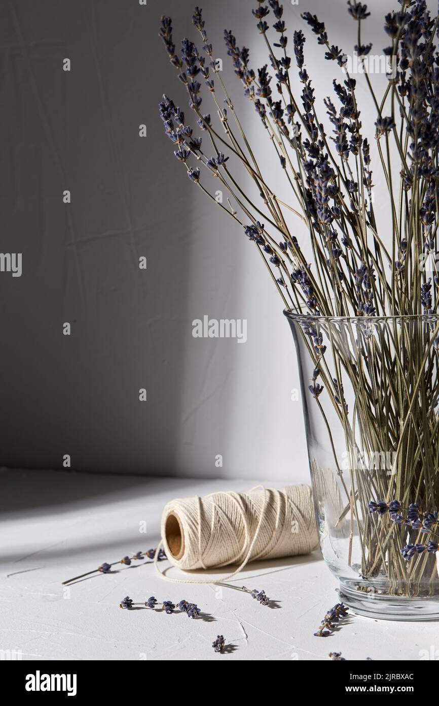 dried lavender flowers in vase and craft rope Stock Photo Alamy