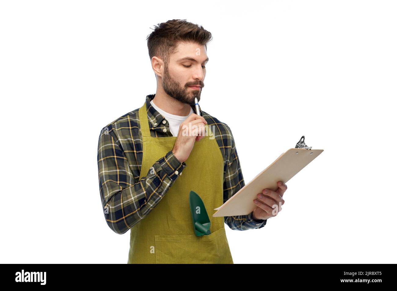 male gardener with clipboard and pen thinking Stock Photo