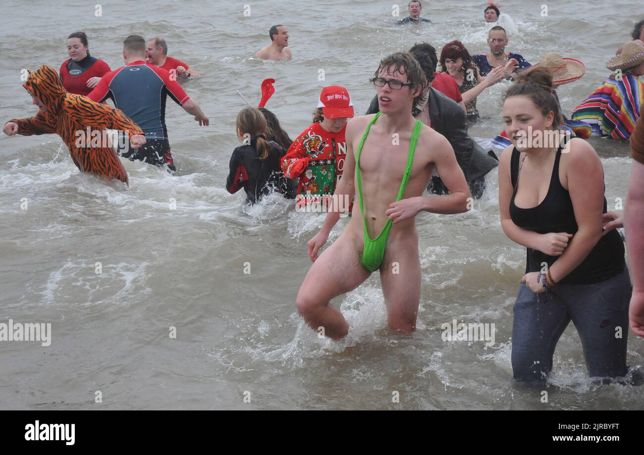 A MANKINI JOINS THE GOSPORT INSHORE RESCUE NEW YEARS DIP AT STOKES BAY, GOSPORT. PIC MIKE WALKER,2012 MIKE WALKER PICTURES Stock Photo