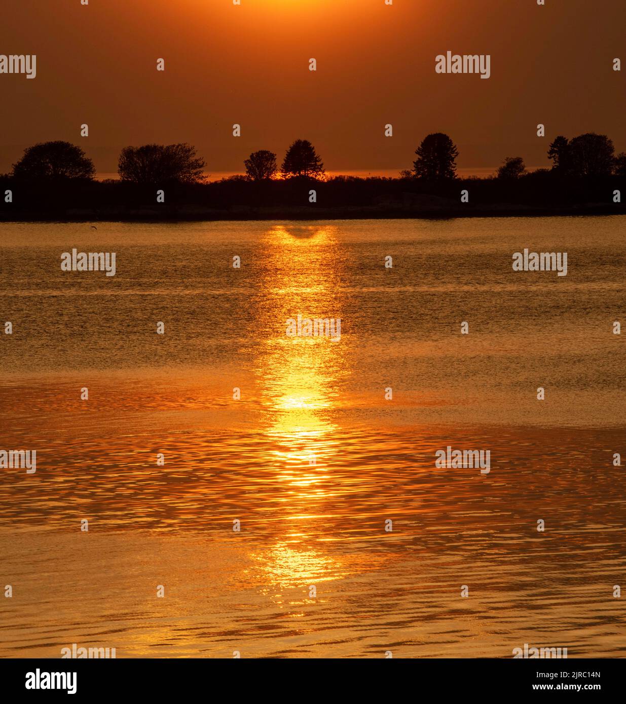 May 22, 2022.  7:49 pm.  Sunset from Barnes Island. Stock Photo
