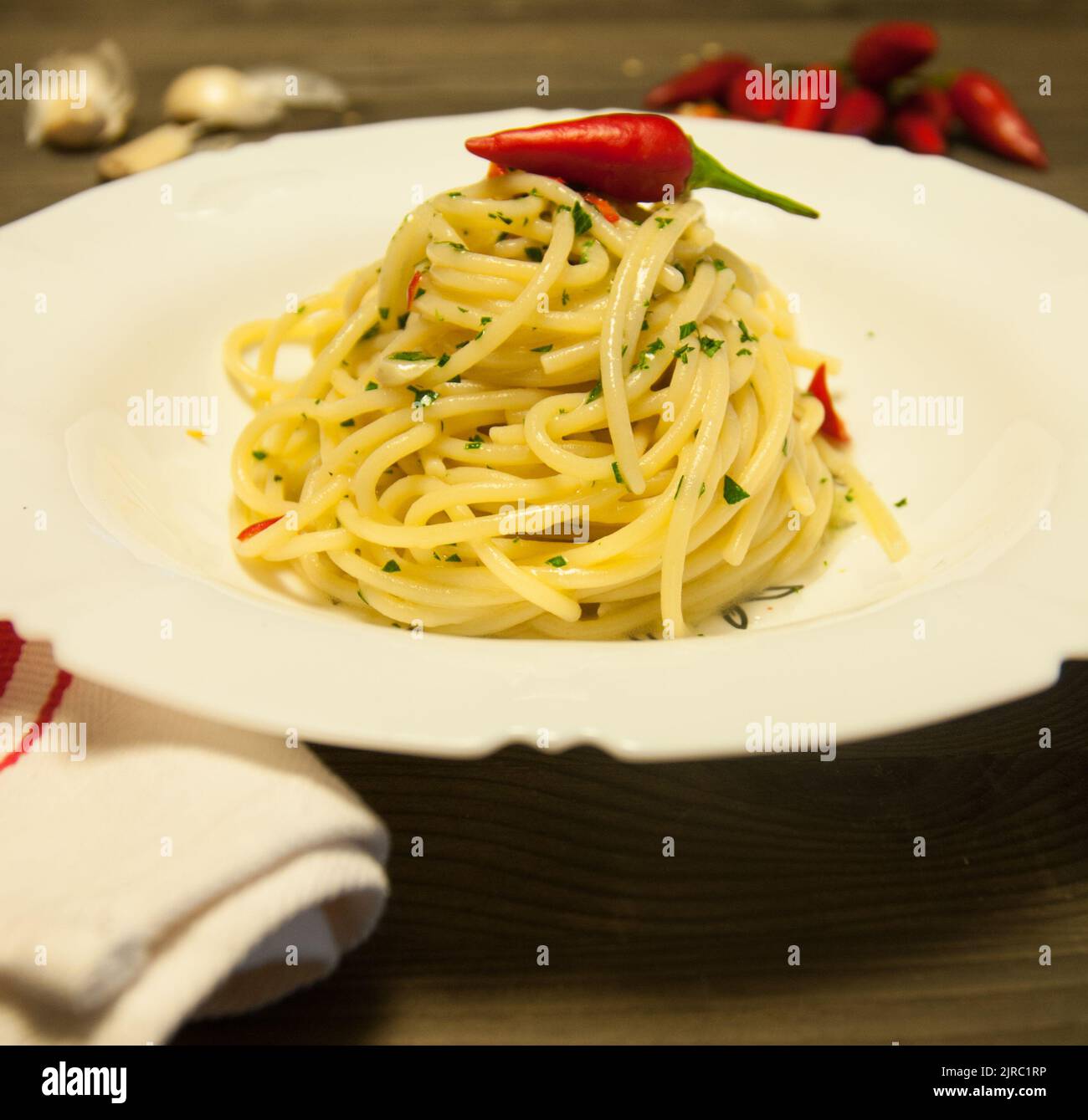 Delicious spaghetti with oil, garlic and chilli, typical Italian Stock Photo