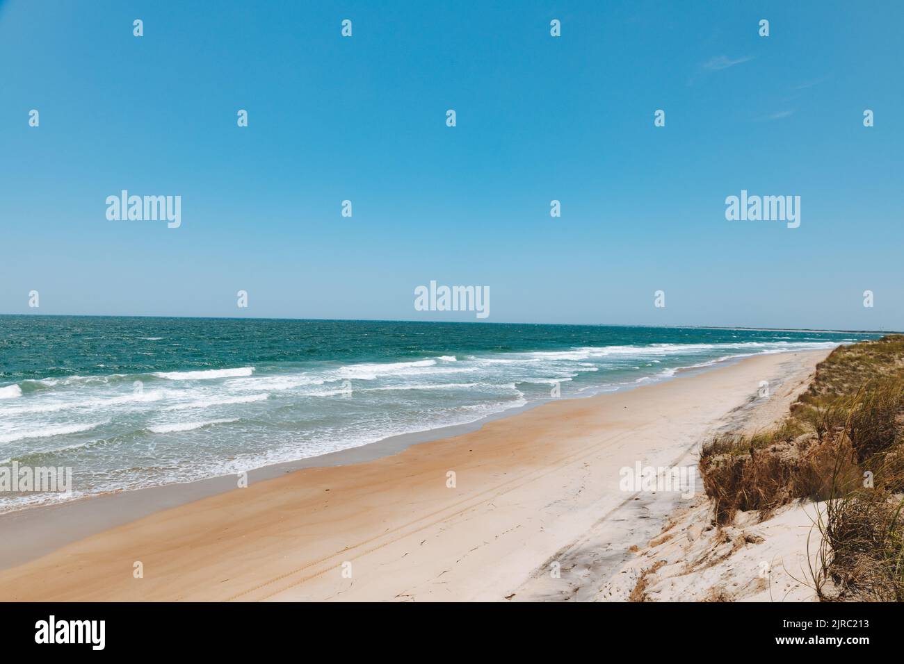 A beautiful view of the sea with a sandy beach in Shackleford Banks