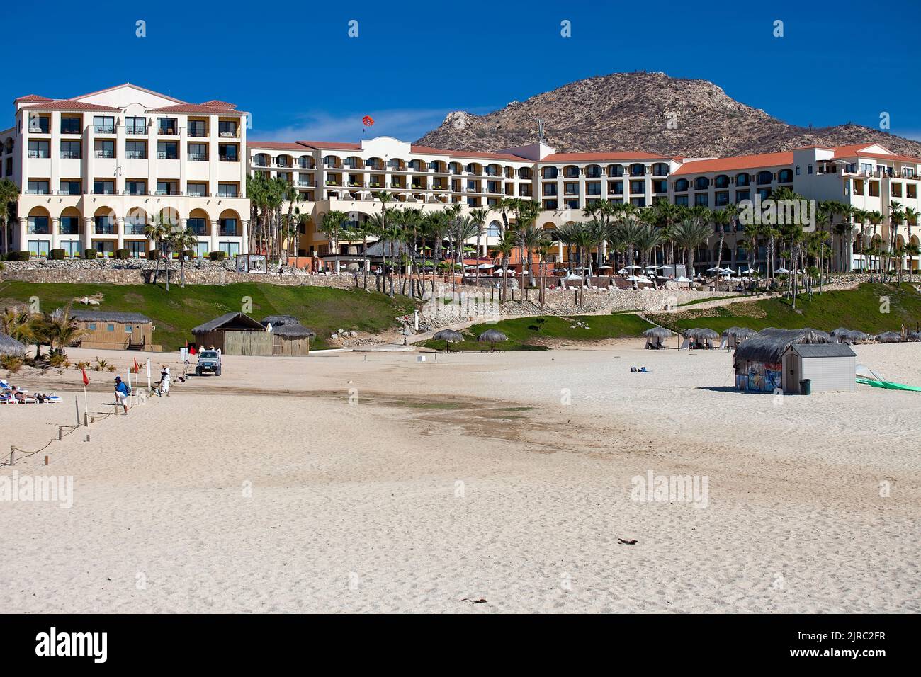 Cabo San Lucas, Mexico - February 13, 2011:  Guests enjoying a luxury resort hotel and spa located on the sea of Cortez and Cabo beach in Mexico. Stock Photo