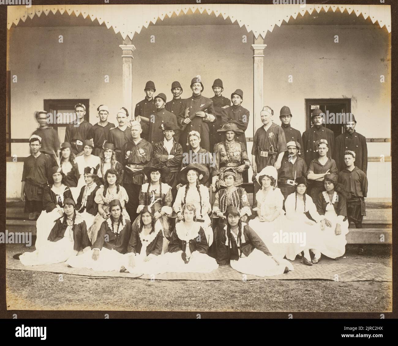 Group in theatrical costumes. From the album: Samoa, circa 1916, Sāmoa, maker unknown. Stock Photo