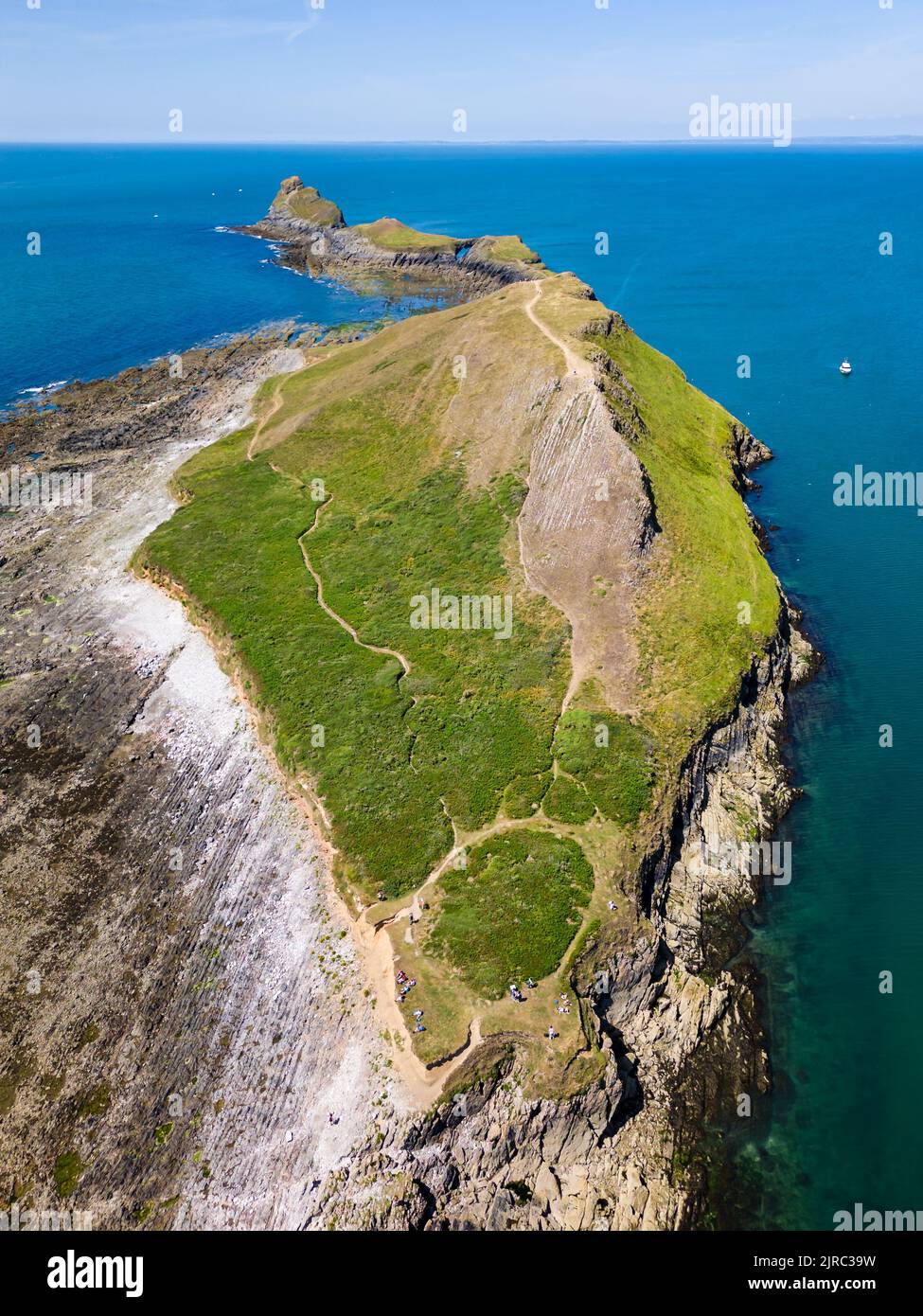 Aerial view of Worm's Head on the coast of Wales at low tide (Rhossili) Stock Photo